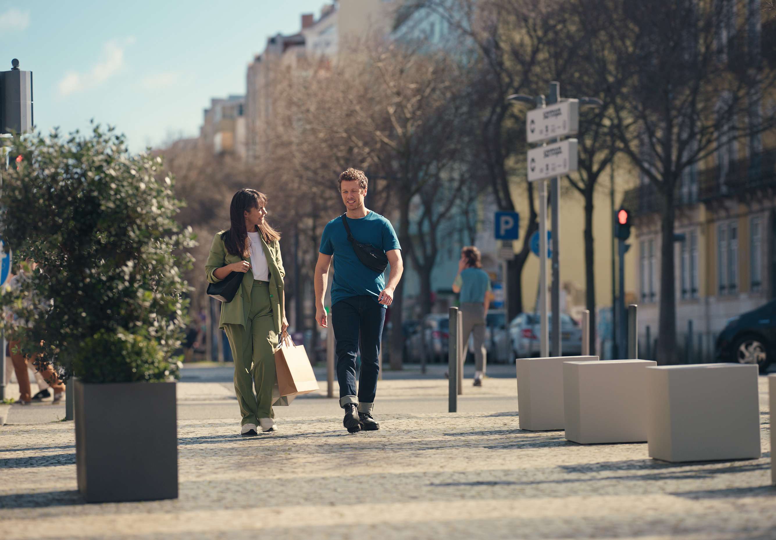 Man and woman walking down the street